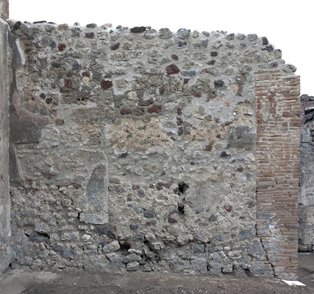 V.1.3 Pompeii. c.2012.
Room “a”, east wall of tablinum. Photo by Hans Thorwid.
“E wall in 2012. Restored parts of the wall photographed and merge with the lower part and floor line of earlier photos from 2005-7.”
Photo and words courtesy of the Swedish Pompeii Project. 
