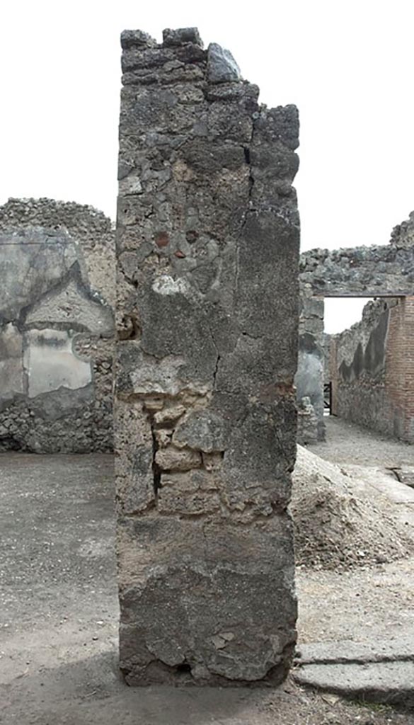 V.1.3 Pompeii. c.2013.
Room “d”, pilaster on west end of south side, with doorway to atrium, on right. Photo by Hans Thorwid.
Photo courtesy of the Swedish Pompeii Project. 
