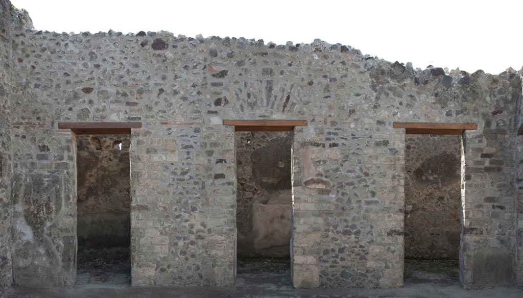 V.1.3 Pompeii. 2012. West wall of atrium, after restoration, with doorways to rooms 7, 6 and 5. Photo by Hans Thorwid.
Photo courtesy of the Swedish Pompeii Project. 
