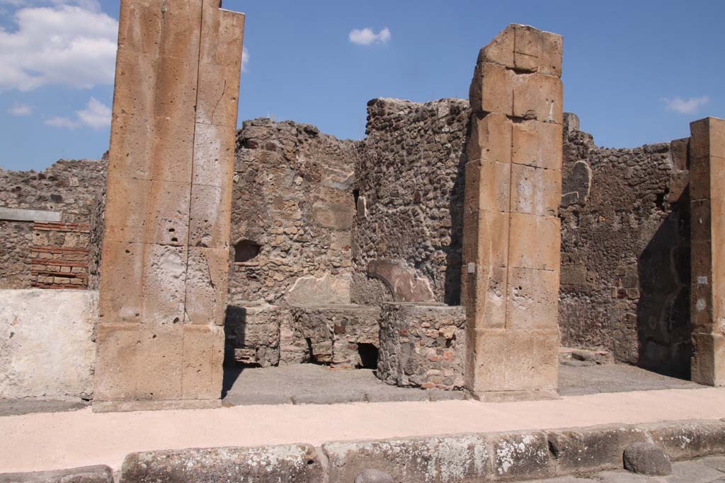 V.1.5 Pompeii. September 2021. Looking north towards entrance doorways on Via di Nola. Photo courtesy of Klaus Heese.