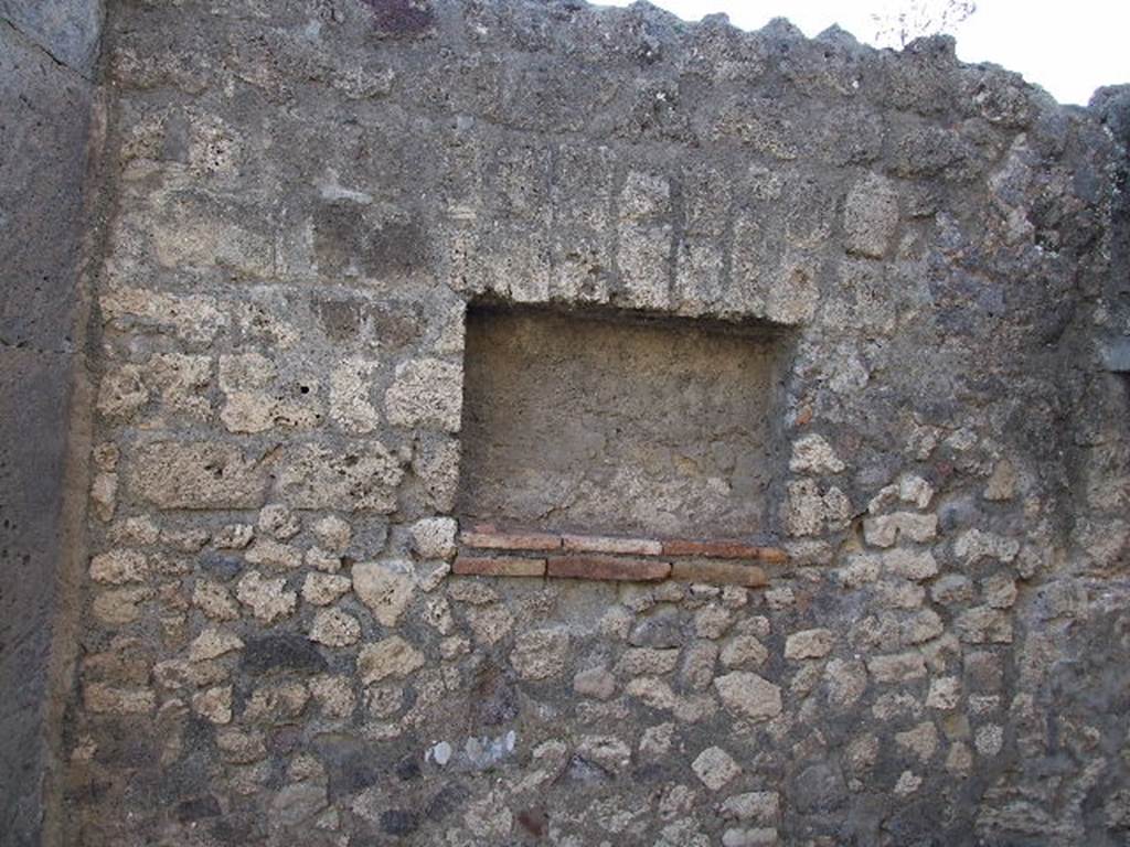 V.1.5 Pompeii.  December 2006.  Niche in west wall.