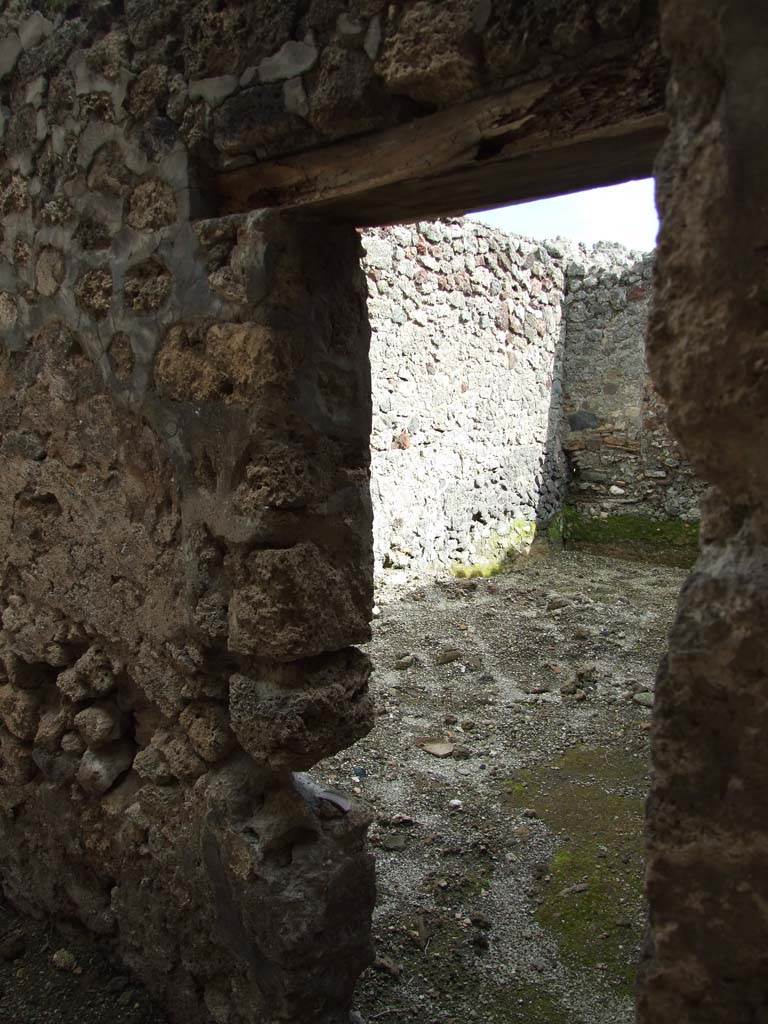 V.1.7 Pompeii. March 2009. Doorway to Room 16, on east side of peristyle.