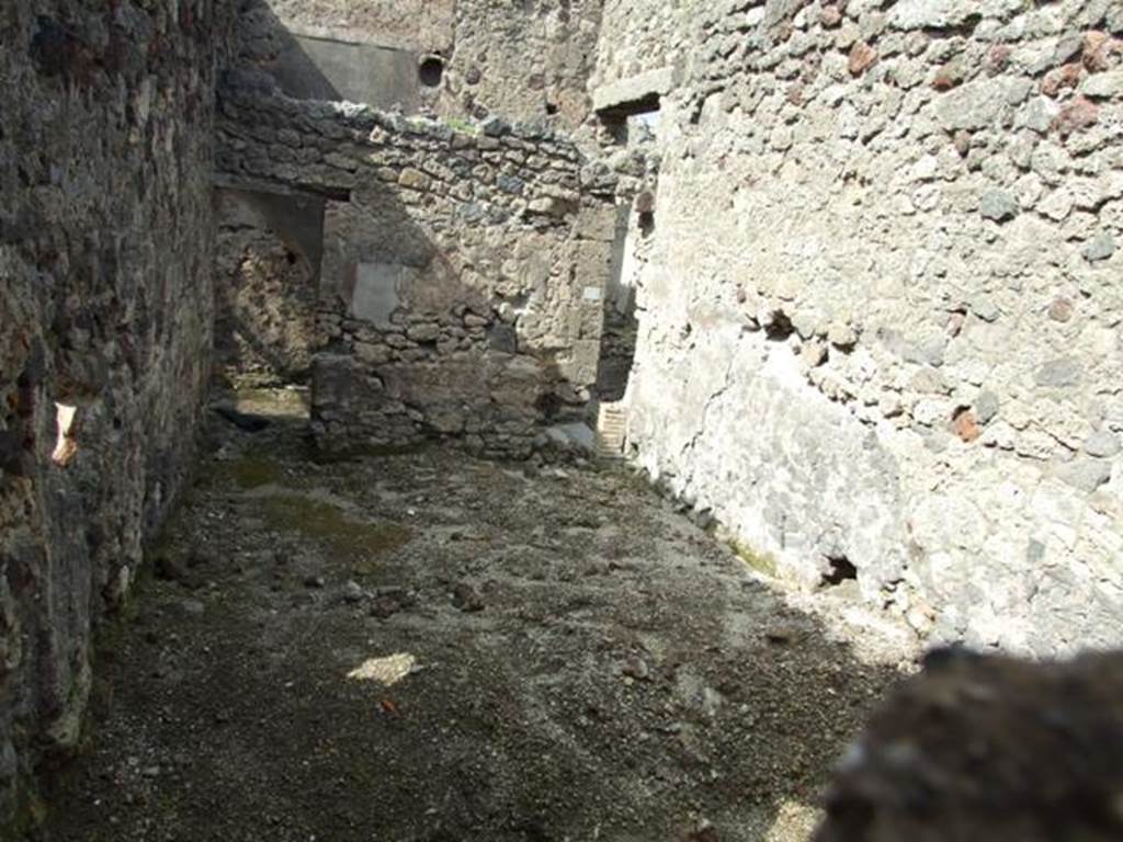 V.1.7 Pompeii. March 2009.   Room on south side of Rear entrance fauces, with two doorways.  Looking north.