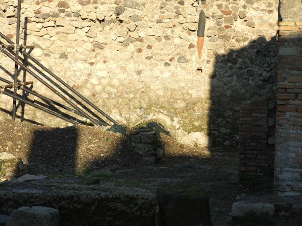 V.1.15 Pompeii. December 2006.  Looking east towards rear of bakery, under restoration.