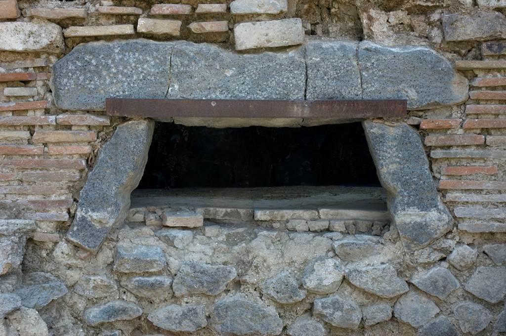 V.1.15 Pompeii. c.2005. Lava stone opening of oven “z”. Photo by Hans Thorwid. 
Photo courtesy of the Swedish Pompeii Project.
