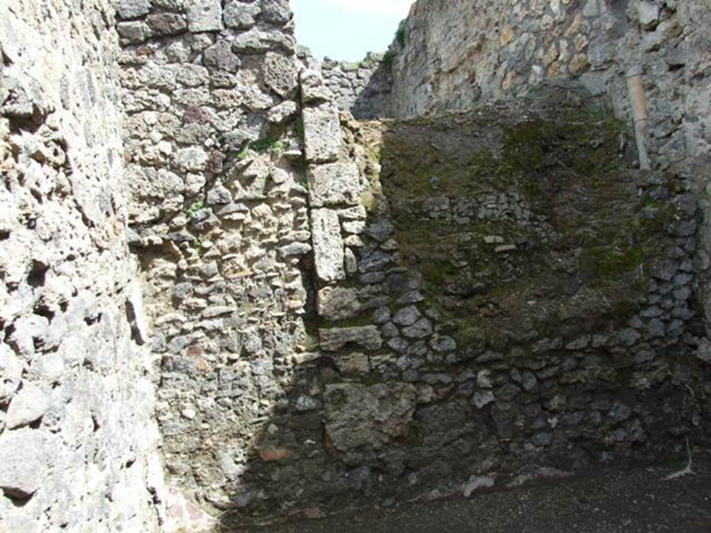 V.1.15 Pompeii.  April 2009. Room in Bakery on south side.   East wall and the side of the Large Oven.