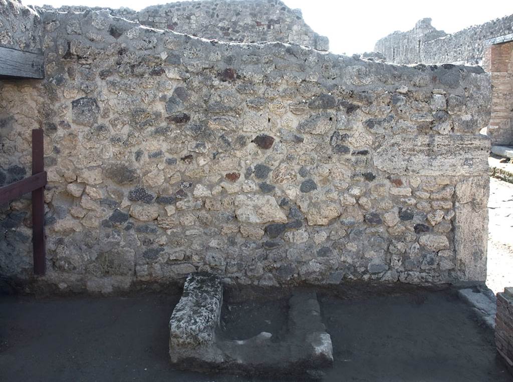 V.1.20 Pompeii. 2001. 
South wall of shop-room with remaining first step to an upper floor. Photo by Hans Thorwid.
Photo courtesy of The Swedish Pompeii Project.
