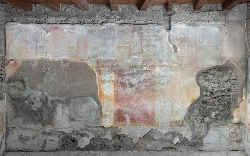 V.1.23 Pompeii. 2012. Room “k”, north wall of triclinium. Photo by Hans Thorwid.
“West wall in room in 2012, after the reconstruction in 2008 when the room was roofed.
Restored parts of the wall photographed and merge with the lower part and floor line of earlier photos from 2005-07.”
Photo and words courtesy of the Swedish Pompeii Project.
