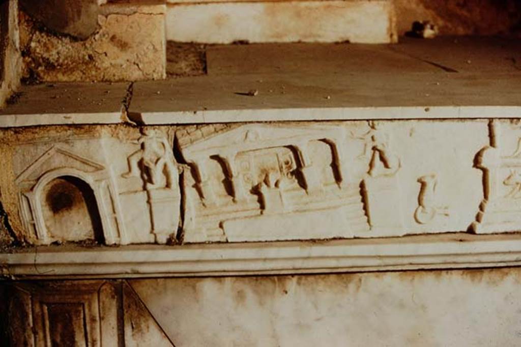 V.I.26 Pompeii. 1957. Marble slab with detail of scenes of the Forum in the earthquake of AD62, on side of household altar in atrium. Photo by Stanley A. Jashemski.
Source: The Wilhelmina and Stanley A. Jashemski archive in the University of Maryland Library, Special Collections (See collection page) and made available under the Creative Commons Attribution-Non Commercial License v.4. See Licence and use details.
J57f0413
