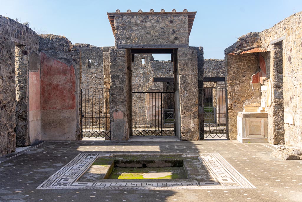 V.1.26 Pompeii. October 2023. Room b, looking west across atrium from tablinum i. Photo courtesy of Johannes Eber.