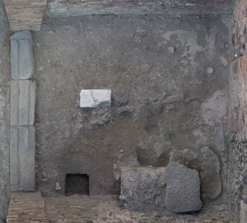 V.1.29 Pompeii. c.2011.  
Threshold of doorway, flooring and detail of hearth, from above. Photo by Hans Thorwid.
Photo courtesy of The Swedish Pompeii Project.
