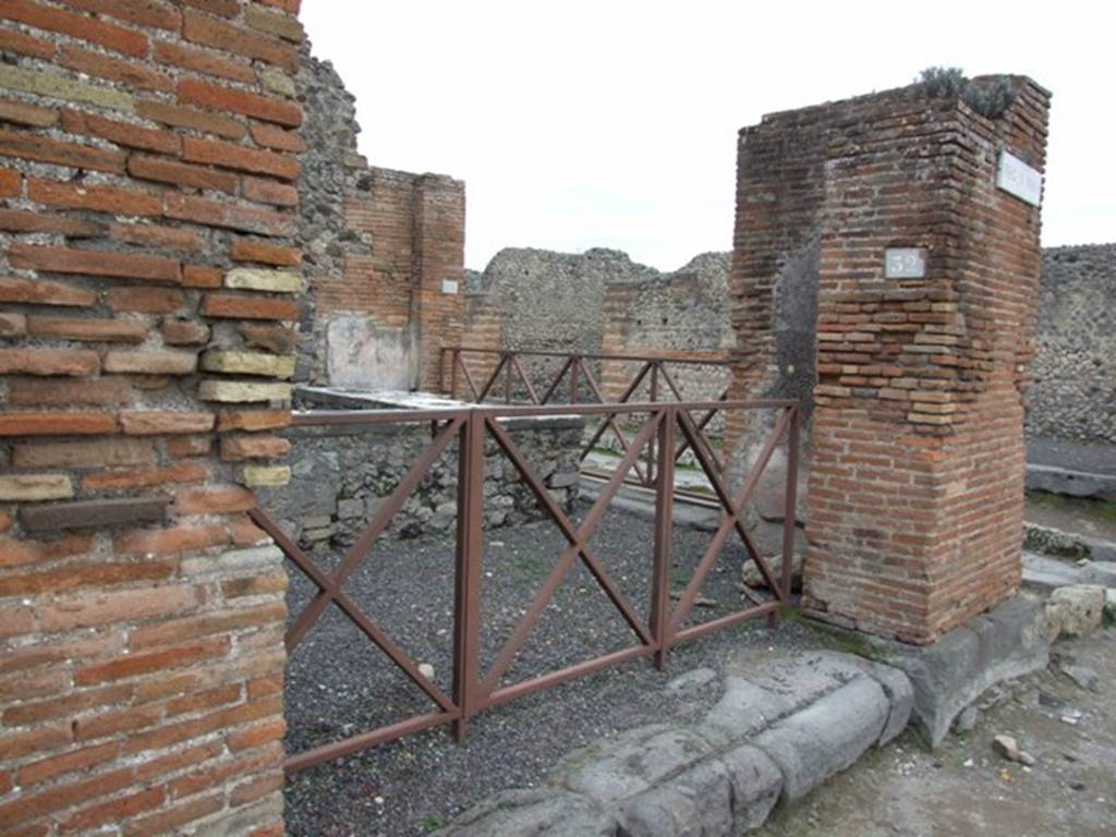 V.1.32 Pompeii. December 2007. Entrance on Via del Vesuvio. Looking south-east towards other entrance at V.1.1. According to Della Corte, a graffito was found on the north of this entrance, which attributed the caupona to a certain Fortunato. It was found on the pilaster to the left, and read:
H]olconium [Priscum]
Fortunatus (rogat)    [CIL IV 831]
See Della Corte, M., 1965.  Case ed Abitanti di Pompei. Napoli: Fausto Fiorentino. (p.126)
