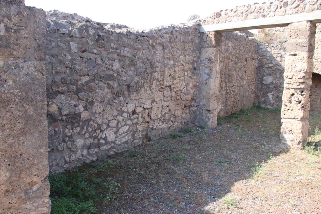 V.2.3 Pompeii. October 2023. Looking north along west wall of bar-room. Photo courtesy of Klaus Heese.