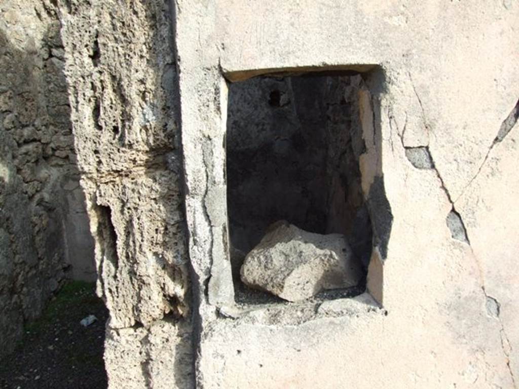 V.2.4 Pompeii. December 2007. Window in wall on east side of atrium looking into room 8. 