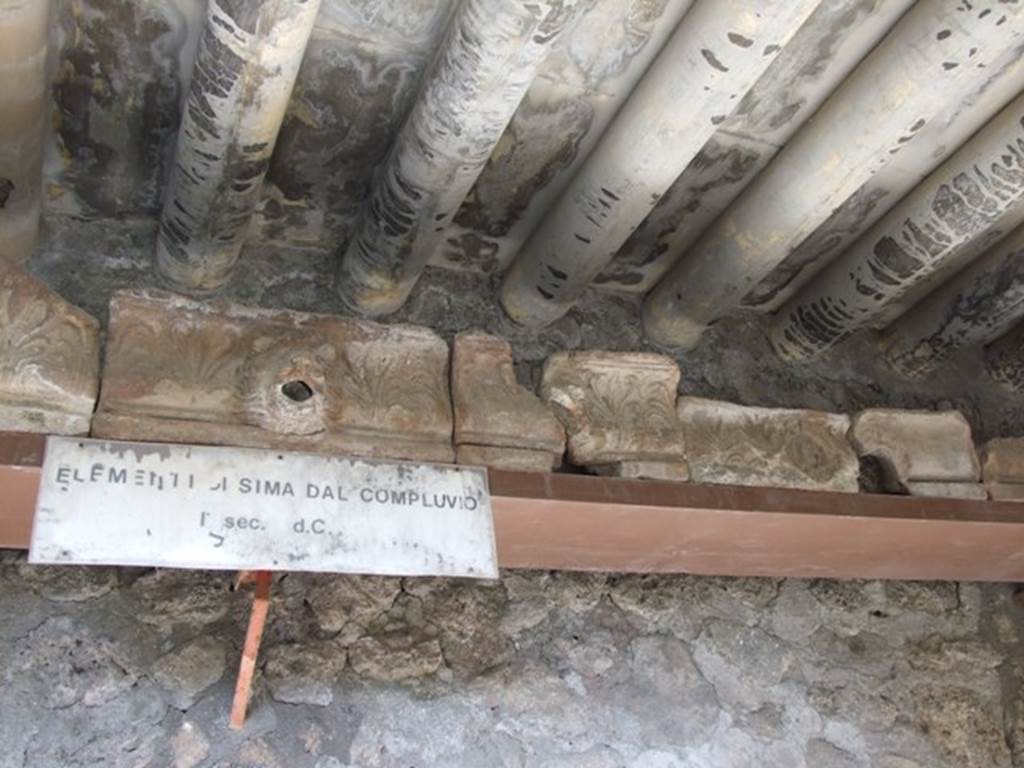 V.2.4 Pompeii. December 2007. Spouts on a shelf in peristyle 13. 
Label says “Elementi di sima dal compluvio”, “Parts of the moulding around the compluvium”.


