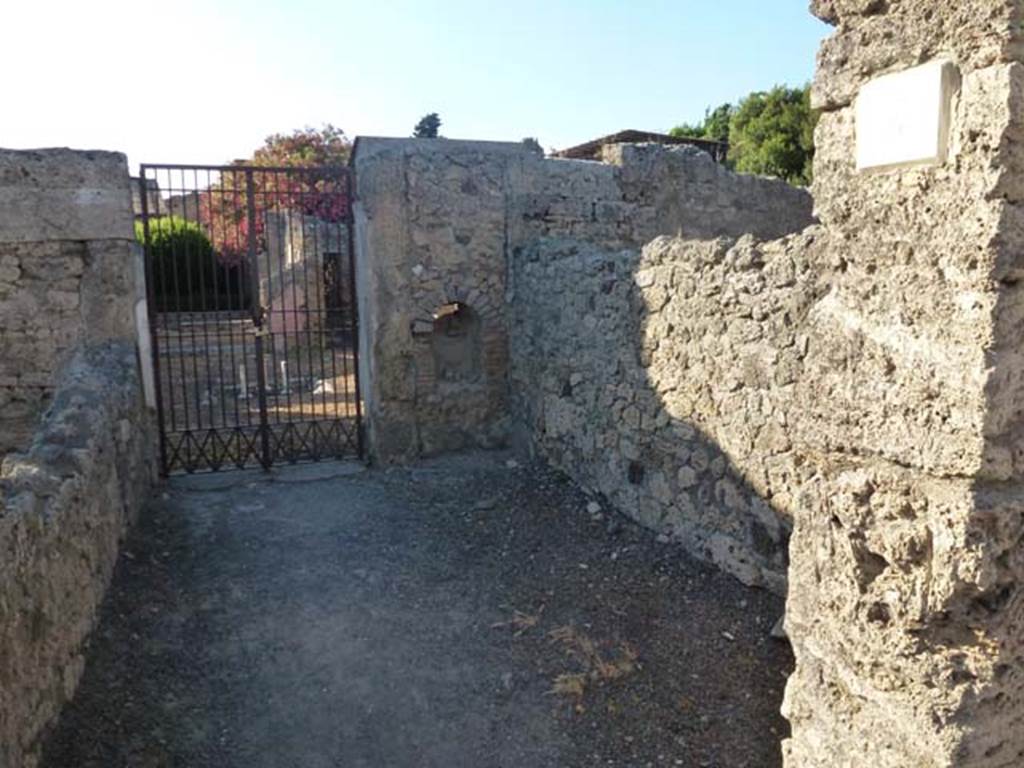 V.2.4 Pompeii. June 2012. Looking north to entrance doorway. Photo courtesy of Michael Binns.