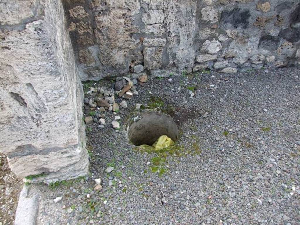 V.2.6 Pompeii. March 2009. Cistern mouth near south-west corner of shop.