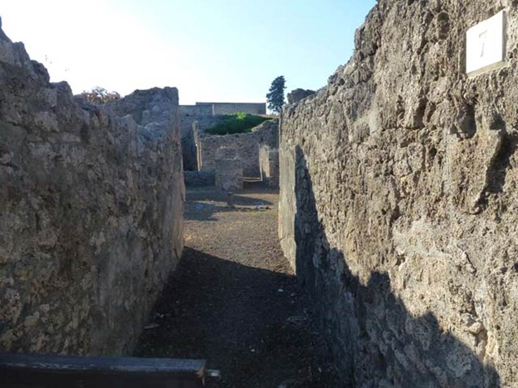 V.2.7 Pompeii. June 2012. 
Looking north from entrance corridor or fauces, across atrium around which were cubicula and the ala. Photo courtesy of Michael Binns.


