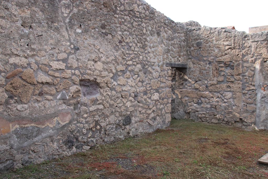 V.2.10 Pompeii. October 2022. West side of atrium with doorway to room 2. Photo courtesy of Klaus Heese.