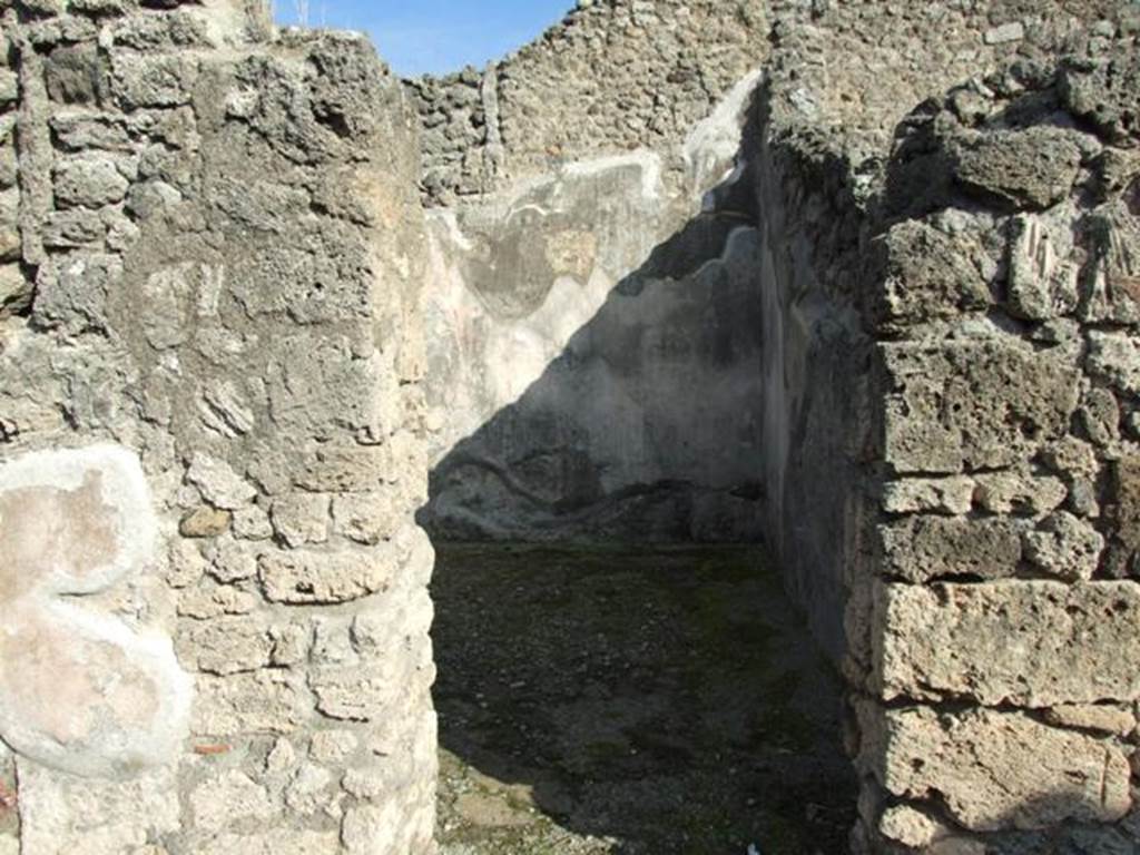 V.2.10 Pompeii. December 2007. Doorway to room 5.
According to NdS, this doorway led to a spacious room on a slightly higher level, and which could have been a triclinium.
It was decorated with two paintings, both relative to the myth of Daedalus and Pasiphae.
The one on the east wall, see below, was cut. 
Only a trace remained of the one on the west wall.
Straight ahead, Sogliano could see the figure of Pasiphae sitting on a throne and turning to the left.
She was wearing a purple robe fringed with blue.
To the left of her was the outline of a cow, near to which would have been the figure of Daedalus, who would have been almost in the middle.
See Notizie degli Scavi, 1891, p. 269.
See Notizie degli Scavi di Antichità, 1896, p. 437.
