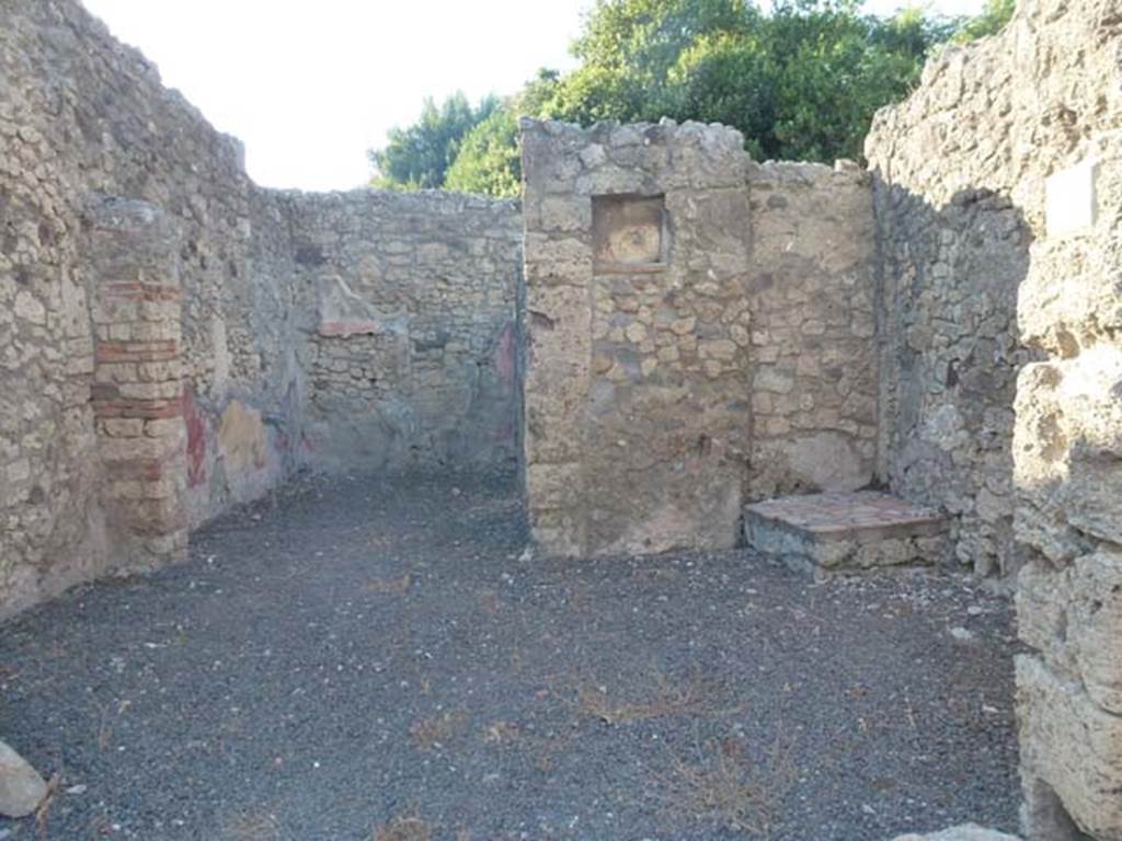 V.2.14 Pompeii. June 2012. Looking north towards rear room, lararium and base for stairs. Photo courtesy of Michael Binns.