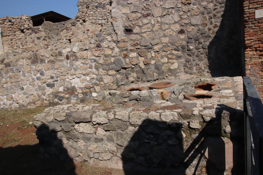 V.2.19 Pompeii. October 2022. Looking east across counter. Photo courtesy of Klaus Heese.