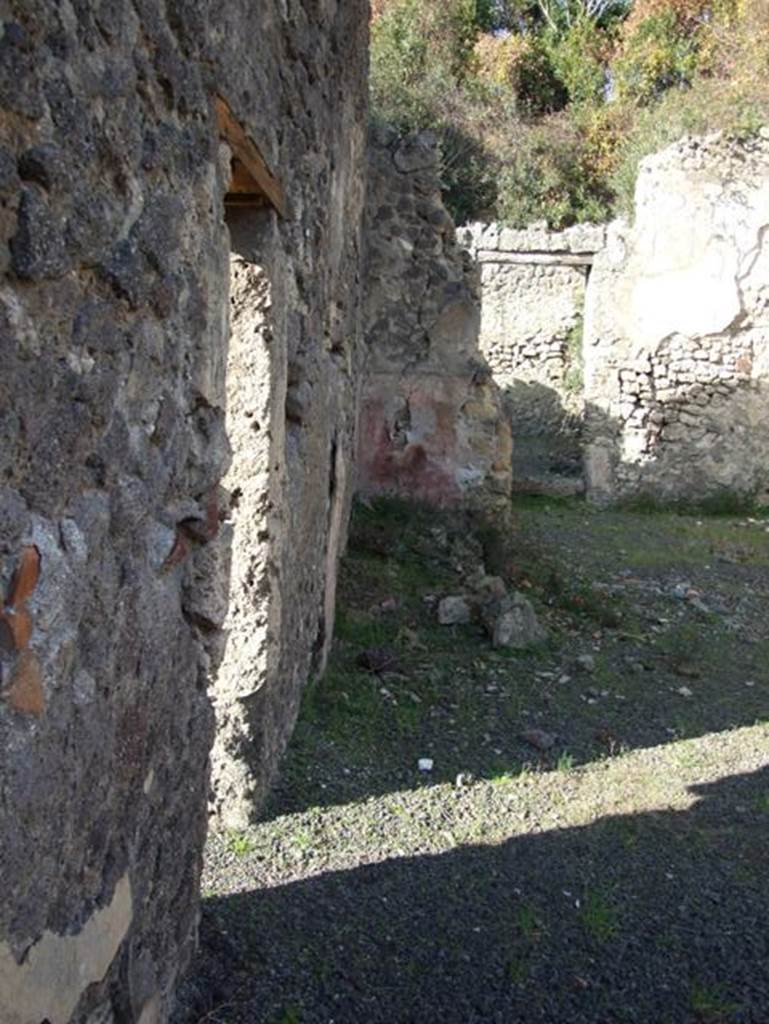 V.2.19 Pompeii. December 2007. West wall, site of steps to upper floor, with doorway to V.2.17.    