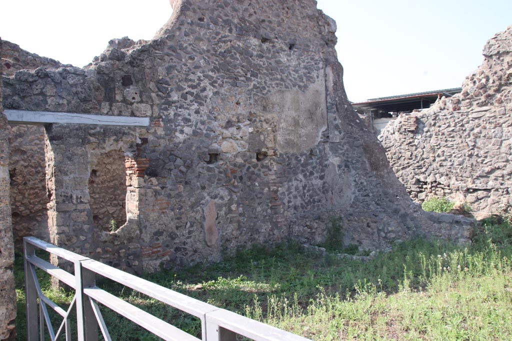 V.3.2 Pompeii. October 2023. Looking towards doorway and window in west wall of workshop. Photo courtesy of Klaus Heese.