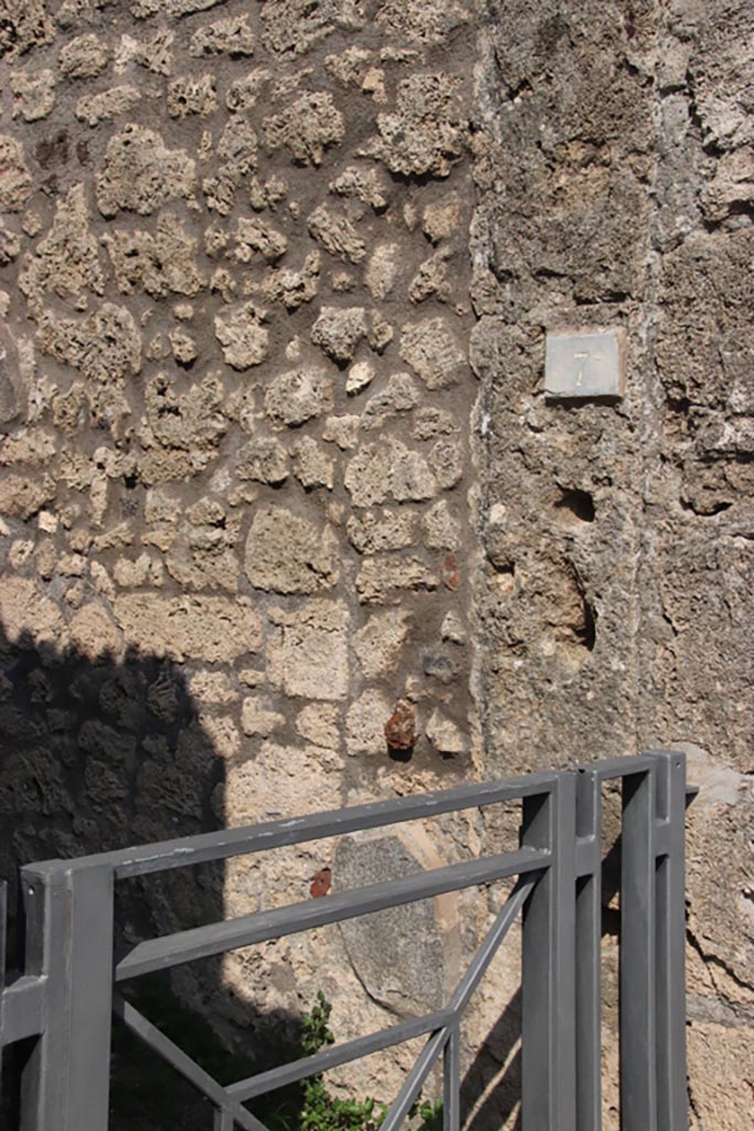 V.3.7 Pompeii. October 2023. 
Looking east to entrance doorway on Via di Nola. Photo courtesy of Klaus Heese.
