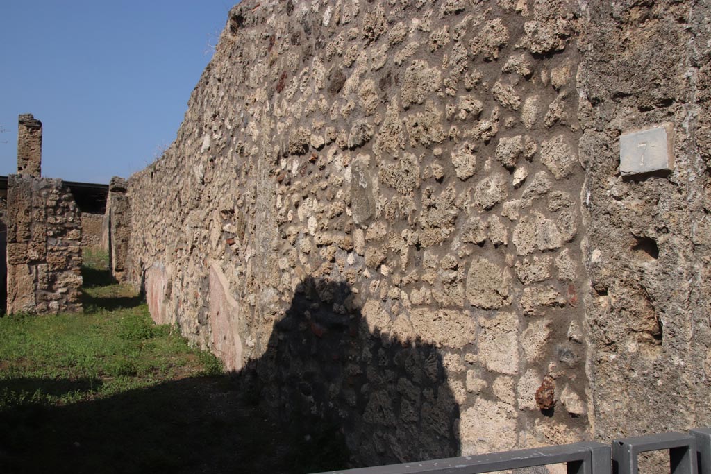 V.3.7 Pompeii. October 2023. 
Looking north from entrance doorway along east wall of vestibule, atrium and corridor. Photo courtesy of Klaus Heese.
