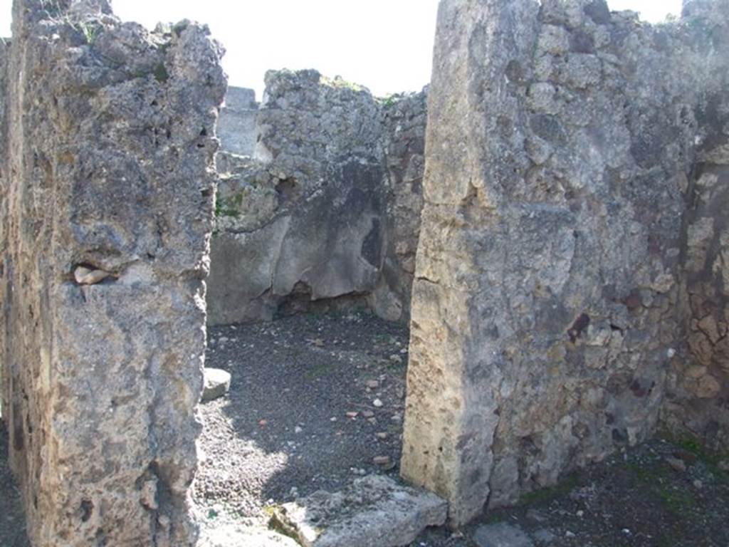 V.3.7 Pompeii.  March 2009. Doorway to Cubiculum, on south west side of atrium.