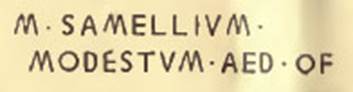 V.3.12 Pompeii. A tabella ansata, a plaque with dovetailed ends, was found in December 1902 on the left of the entrance doorway. Painted in black letters on this was the epigraph
M. SAMELLIVM MODESTVM AED.  O. F.