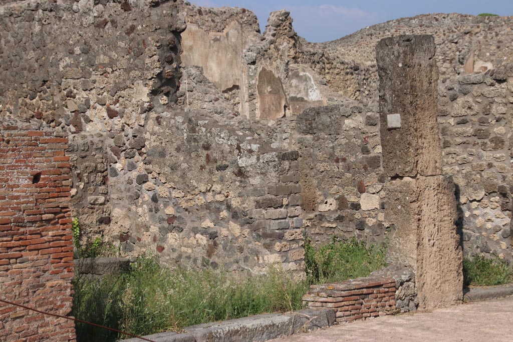 V.4.2 Pompeii. October 2023. 
Looking towards east wall from entrance doorway, and side doorway into V.4.3. Photo courtesy of Klaus Heese.
