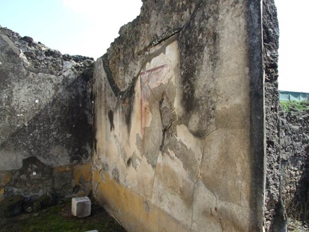 V.4.3 Pompeii. March 2009. South wall of triclinium, and doorway to cupboard or small room.
According to Sogliano, each wall of this room was painted with a white background.
All walls had a central painting. On the south wall was a painting of Ariadne being found in Naxos by Dionysus, see below. 
