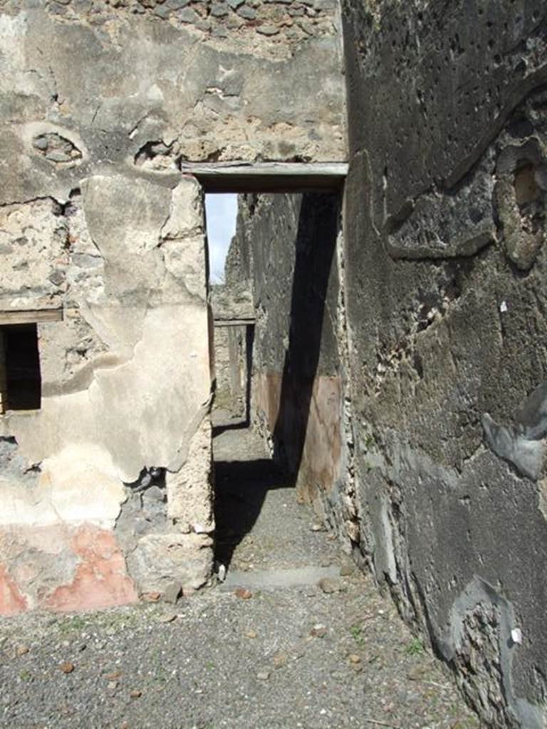 V.4.3 Pompeii.  March 2009.  North wall of atrium, and corridor to rear.