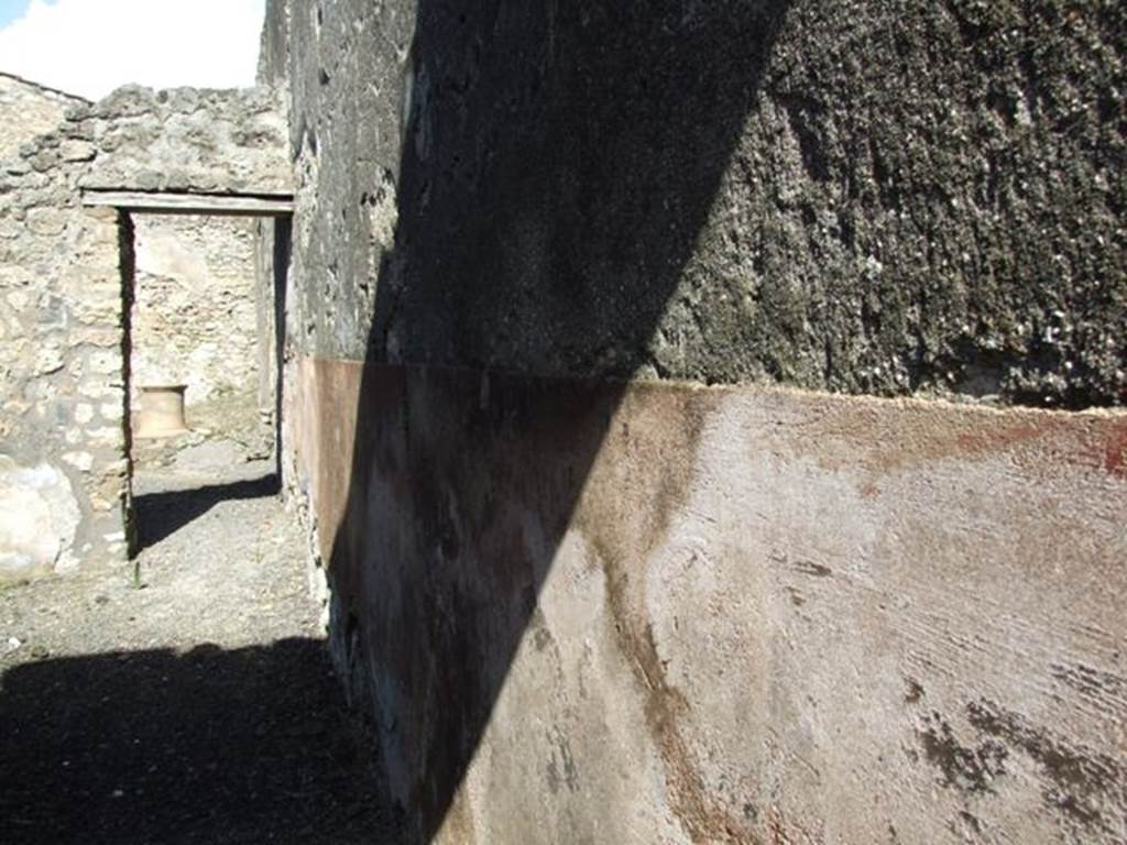 V.4.3 Pompeii.  March 2009. East wall of andron or corridor to rear.