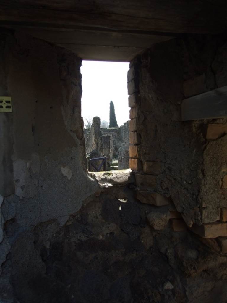 V.4.3 Pompeii.  March 2009. Small cupboard. South wall with window overlooking atrium.