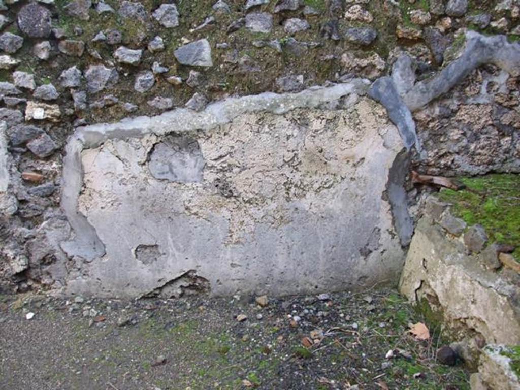 V.4.3 Pompeii.  March 2009. East wall of Kitchen.  Site of Lararium painting, which had three zones, now faded and destroyed. See Frhlich, T., 1991. Lararien und Fassadenbilder in den Vesuvstdten. Mainz: von Zabern. L53 on p.272. See Giacobello, F., 2008. Larari Pompeiani: Iconografia e culto dei Lari in ambito domestico.  Milano: LED Edizioni, p.169.  See Boyce G. K., 1937. Corpus of the Lararia of Pompeii. Rome: MAAR 14.  (119b).