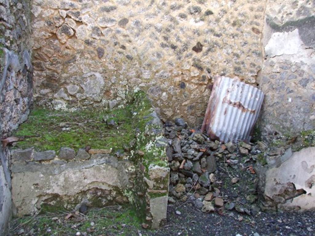 V.4.3 Pompeii.  March 2009.  Hearth against south wall of Kitchen.