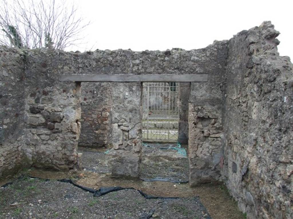 V.4.6 Pompeii. December 2007. Looking from rear of shop towards entrance on Via di Nola. According to Sogliano, found in this rear room where one entered from doorway at V.4.8, were two skeletons, with other finds. See Notizie degli Scavi di Antichità, 1899, (p.103).