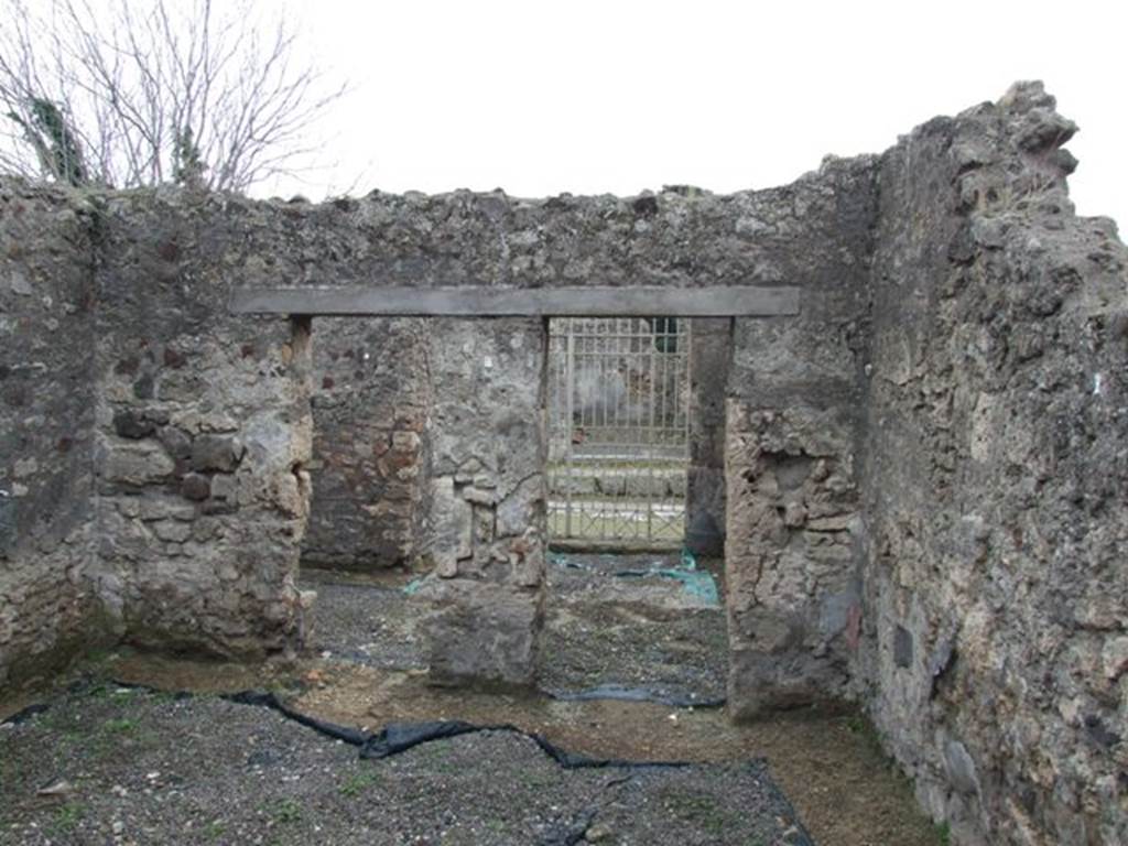 V.4.6/7 Pompeii. December 2007. Looking south across second rear room, towards shop-room with entrance on Via di Nola.  

