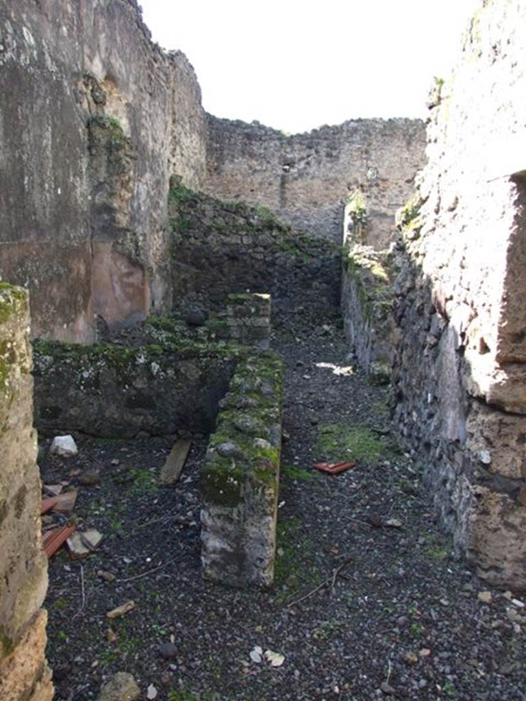 V.4.10 Pompeii.    March 2009. Looking west towards entrance to small room, on south side.
