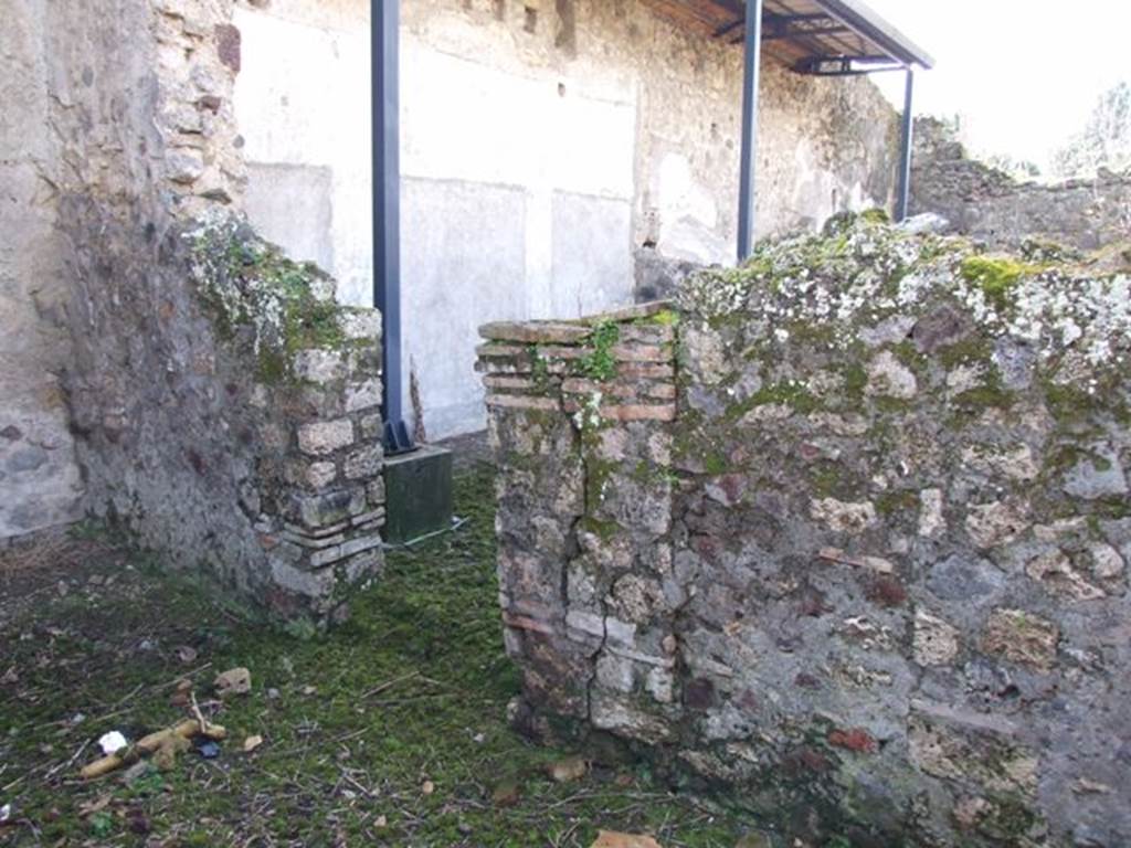 V.4.12 Pompeii.  March 2009. West wall, with doorway to Triclinium of V.4.13.