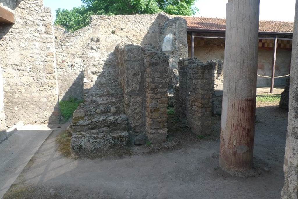 V.4.a Pompeii. July 2010. 
Looking north towards small room ‘n’, on left, steps, and doorway to kitchen and latrine, centre right. Photo courtesy of Michael Binns.

