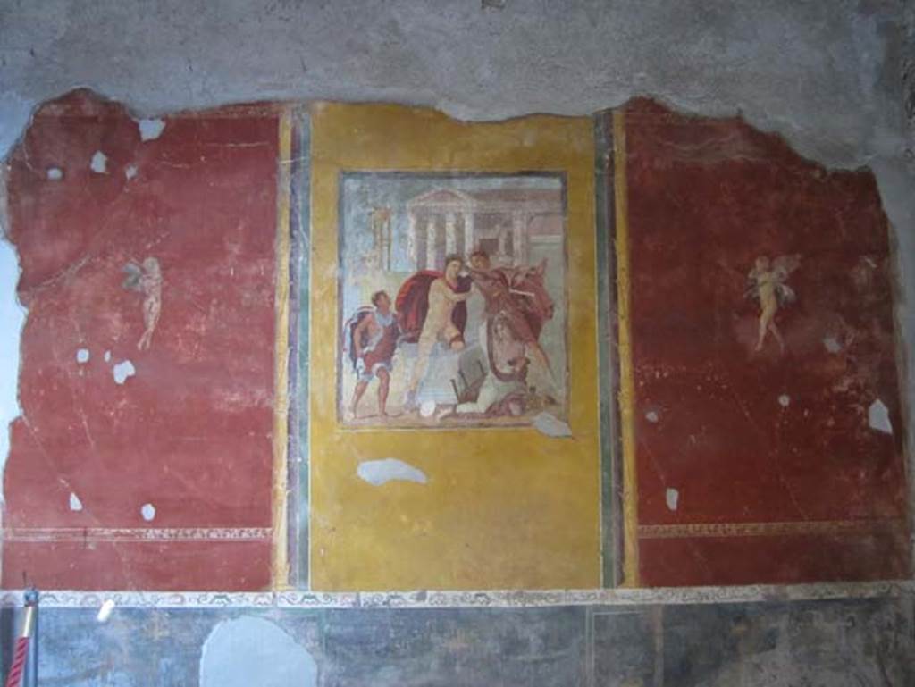 V.4.a Pompeii. March 2012. East wall of the winter triclinium. Photo courtesy of Marina Fuxa.