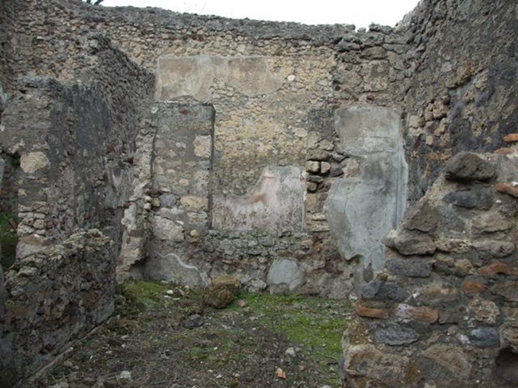 V.5.2 Pompeii. December 2007. Summer triclinium on the east side of the light courtyard, looking north through rear window into winter triclinium. 
According to Mau, found on the wall of this summer triclinium was a scratched graffito. It read 
Fures foras, frugi intro    [CIL IV 4278]
This translated as - 
Let thieves keep out, let honest folk come in    [CIL IV 4278]
See Mau, A., 1907, translated by Kelsey, F. W., Pompeii: Its Life and Art. New York: Macmillan. (p. 343-44 including description and plan).
