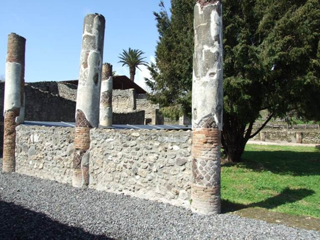 V.5.3 Pompeii. March 2009. Room 7, south-west corner of peristyle.
In BdI, 1890, various inscriptions of the gladiators are listed, including which column they were found on. The columns in the photo above, would have been numbered 3 ( on the left, in the south-west corner), 4 and 5, along the south side. Number 2 would have been the first column on the west side, after number 3 in the south-west corner. The column numbered 1 is no longer in situ. See BdI, 1890, p. 25-39.
