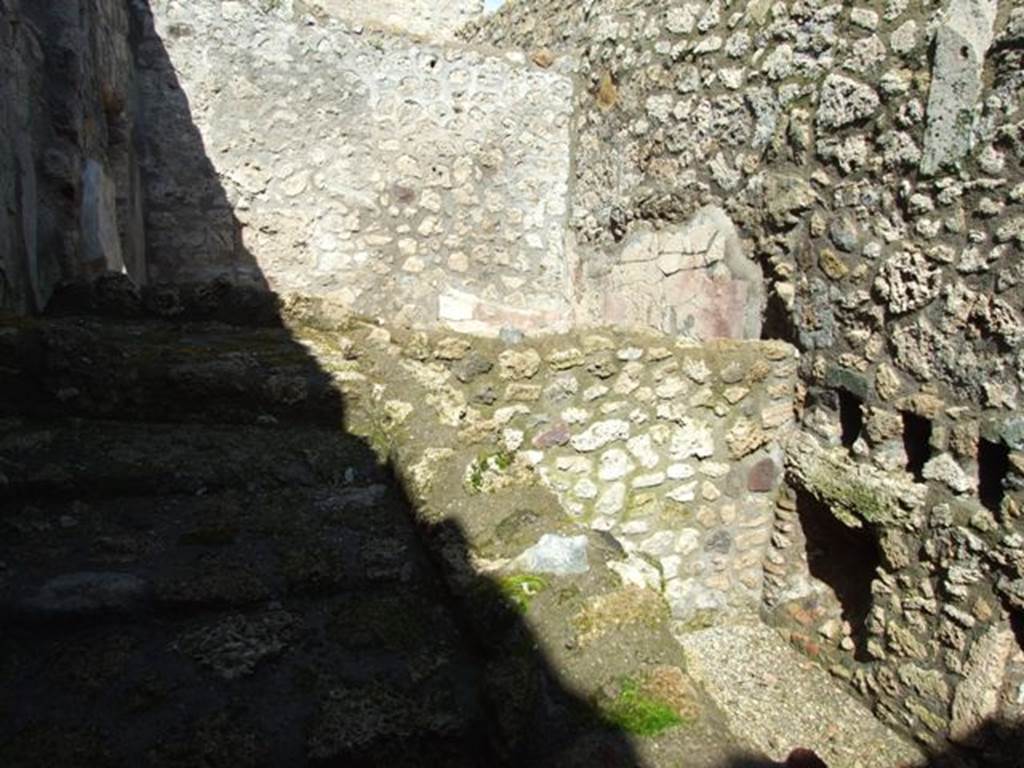 V.5.3 Pompeii.  March 2009.  Room 3.  Staircase to upper floor.  Looking north to Room 4, over the wall, and to north and east wall of rear room.