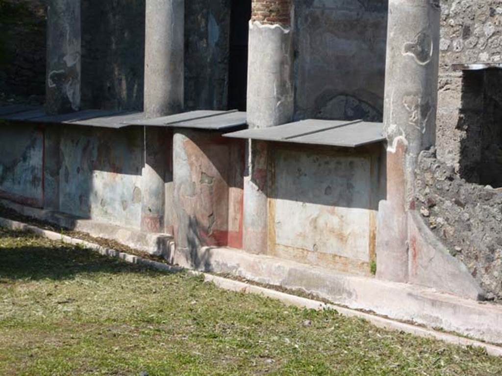 V.5.3 Pompeii. May 2012. Room 7, looking north along east painted wall on peristyle. 
Photo courtesy of Buzz Ferebee.
