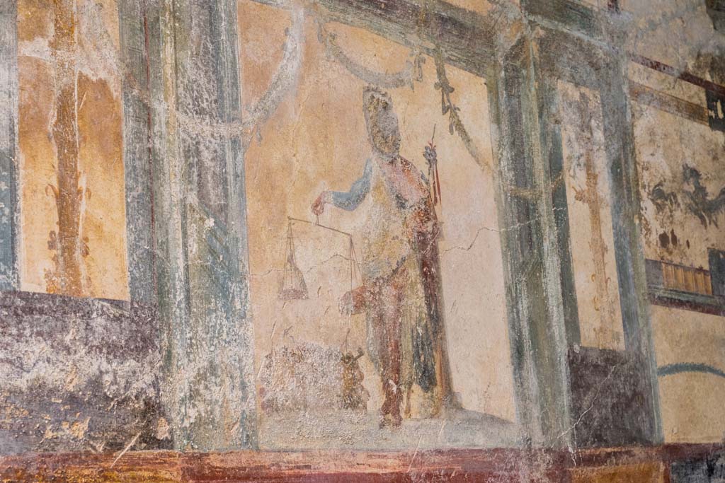 V.6.12 Pompeii. October 2020. Detail of painted animal in centre of panel on east side of red central panel on north wall. 
Photo courtesy of Klaus Heese.
